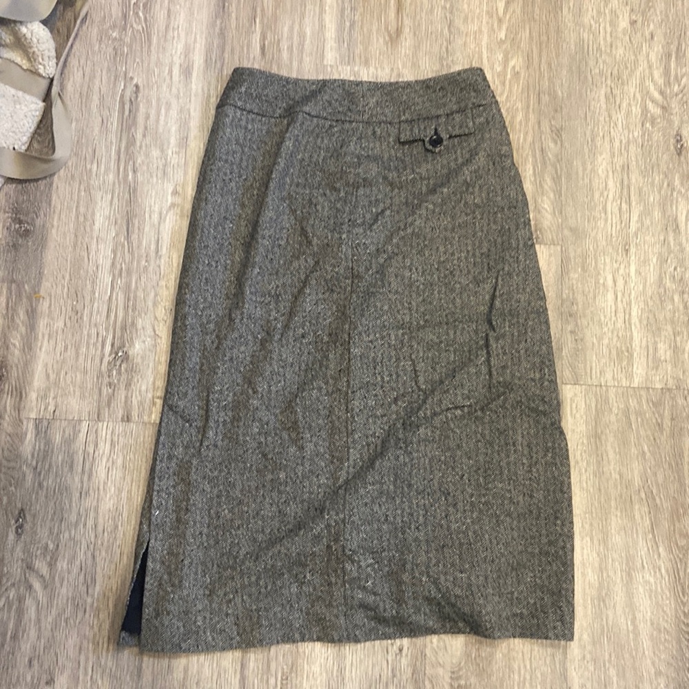 Midi length librarian skirt with a slit